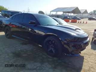2020 Dodge Charger R/T z VIN 2C3CDXCT4LH131260, wystawiony jako IAAI lot #42185512 z przebiegiem 65 197 mil mil oraz . Historia ofert i sprzedaży dostępna na DreamBid. Obrazek 1.