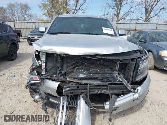 2015 Chevrolet Tahoe LT with VIN 1GNSCBKC4FR552034, listed as a IAAI auction lot 41891302 with 145,969 mi miles and . Bid and sale history available at DreamBid. Image 12.