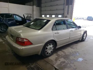 2004 Acura RL w/Navigation System z VIN JH4KA96644C004769, wystawiony jako Copart lot #59800205 z przebiegiem 172 279 mil mil oraz Szkoda całkowita • Salvage title. Historia ofert i sprzedaży dostępna na DreamBid. Obrazek 3.