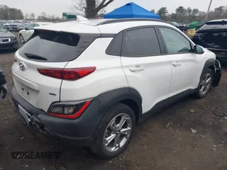 2022 Hyundai Kona SEL with VIN KM8K3CAB2NU858308, listed as a IAAI auction lot 42021360 with 17,894 mi miles and . Bid and sale history available at DreamBid. Image 4.