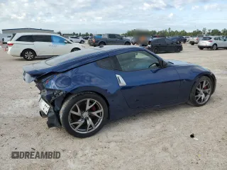 2013 Nissan 370Z with VIN JN1AZ4EH6DM880252, listed as a Copart auction lot 70528464 with 63,111 mi miles and Salvage Title. Bid and sale history available at carsss.com. Image 3.