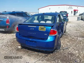 2009 Ford Focus SE with VIN 1FAHP35N59W257031, listed as a IAAI auction lot 41887905 with 192,591 mi miles. Bid and sale history available at carsss.com. Image 4.