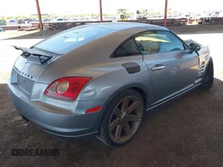 2004 Chrysler Crossfire z VIN 1C3AN69L44X017780, wystawiony jako IAAI lot #42164946 z przebiegiem Nie podano mil oraz . Historia ofert i sprzedaży dostępna na DreamBid. Obrazek 4.
