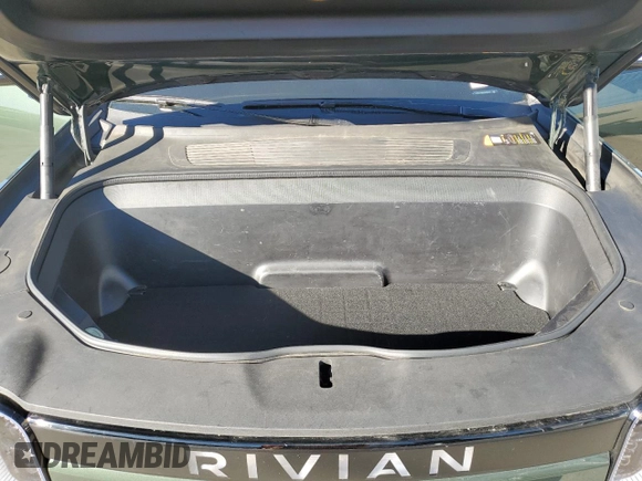 2023 Rivian R1T Adventure with VIN 7FCTGAAA7PN024633, listed as a Copart auction lot 41481365 with 24,965 mi miles and Salvage Title. Bid and sale history available at carsss.com. Image 11.