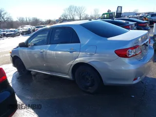 2011 Toyota Corolla L with VIN JTDBU4EE8B9167374, listed as a IAAI auction lot 41312318 with 189,903 mi miles. Bid and sale history available at carsss.com. Image 14.
