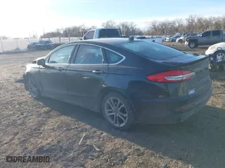 2020 Ford Fusion Hybrid Titanium with VIN 3FA6P0RU9LR141476, listed as a IAAI auction lot 41472921 with 84,433 mi miles. Bid and sale history available at carsss.com. Image 3.