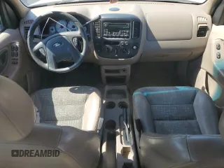 2002 Ford Escape XLS Choice with VIN 1FMYU02112KB00947, listed as a Copart auction lot 48948855 with 223,287 mi miles and Salvage title. Bid and sale history available at DreamBid. Image 8.