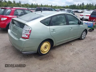 2007 Toyota Prius z VIN JTDKB20U277685606, wystawiony jako IAAI lot #42275241 z przebiegiem 291 225 mil mil oraz . Historia ofert i sprzedaży dostępna na DreamBid. Obrazek 4.