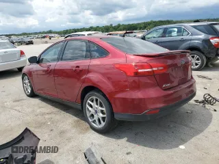 2015 Ford Focus SE with VIN 1FADP3F22FL368703, listed as a Copart auction lot 61609235 with 147,269 mi miles and Salvage title. Bid and sale history available at DreamBid. Image 2.
