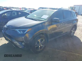 2018 Toyota RAV4 XLE with VIN JTMWFREV9JJ200629, listed as a IAAI auction lot 41821491 with 184,706 mi miles. Bid and sale history available at carsss.com. Image 17.