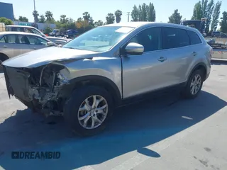 2011 Mazda CX-9 Sport with VIN JM3TB2BVXB0307360, listed as a IAAI auction lot 42580629 with 136,928 mi miles and . Bid and sale history available at DreamBid. Image 20.
