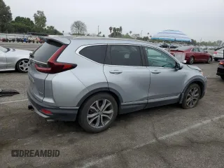 2020 Honda CR-V Touring z VIN 7FARW1H96LE006653, wystawiony jako Copart lot #57167475 z przebiegiem 49 286 mil mil oraz Szkoda całkowita • Salvage title. Historia ofert i sprzedaży dostępna na DreamBid. Obrazek 3.