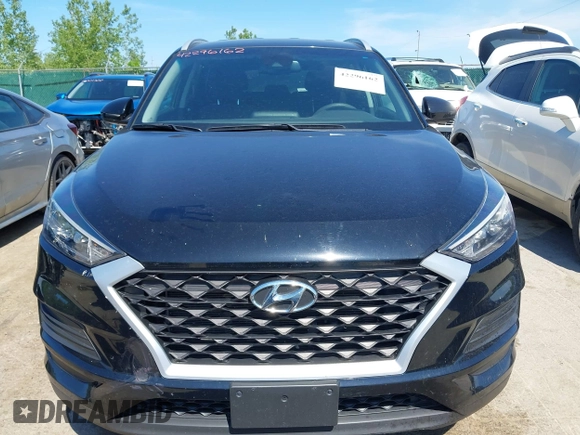 2019 Hyundai Tucson Value with VIN KM8J3CA46KU935335, listed as a IAAI auction lot 42296162 with 65,099 mi miles and . Bid and sale history available at DreamBid. Image 12.
