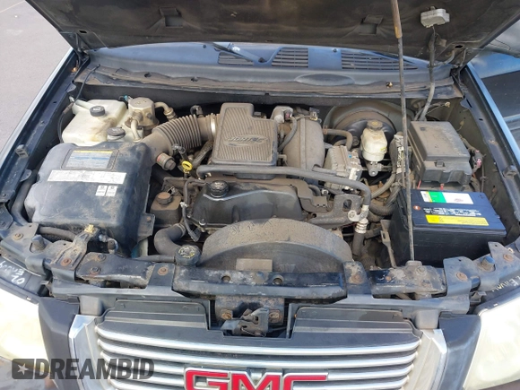 2002 GMC Envoy SLE z VIN 1GKDS13S922523317, wystawiony jako IAAI lot #42374259 z przebiegiem 185 686 mil mil oraz . Historia ofert i sprzedaży dostępna na DreamBid. Obrazek 10.