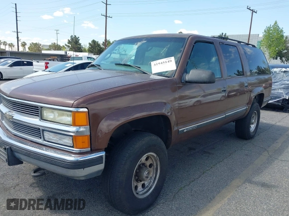 1999 Chevrolet Suburban with VIN 1GNGK26J9XJ494147, listed as a IAAI auction lot 41945149 with 102,652 mi miles. Bid and sale history available at carsss.com. Image 2.