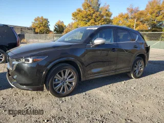2024 Mazda CX-5 2.5 Turbo Signature with VIN JM3KFBXY8R0398139, listed as a Copart auction lot 76885954 with 7,266 mi miles and Salvage Title. Bid and sale history available at carsss.com. Image 1.
