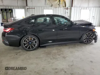 2022 BMW i4 eDrive40 with VIN WBY73AW03NFM94635, listed as a Copart auction lot 60828383 with 4,570 mi miles. Bid and sale history available at carsss.com. Image 3.