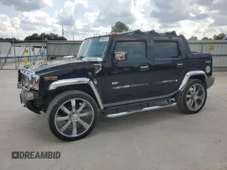 2005 Hummer H2 SUT z VIN 5GRGN22UX5H105194, wystawiony jako Copart lot #59896735 z przebiegiem 170 926 mil mil oraz Czysty tytuł • Clean title. Historia ofert i sprzedaży dostępna na DreamBid. Obrazek 1.