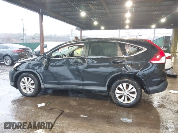 2014 Honda CR-V EX with VIN 2HKRM4H59EH702122, listed as a IAAI auction lot 41040243 with 97,813 mi miles and . Bid and sale history available at DreamBid. Image 14.