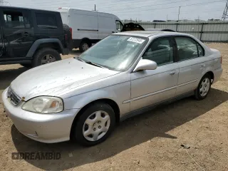 1999 Honda Civic EX with VIN 1HGEJ8641XL057684, listed as a Copart auction lot 57272945 with 198,323 mi miles and Clean title. Bid and sale history available at DreamBid. Image 1.