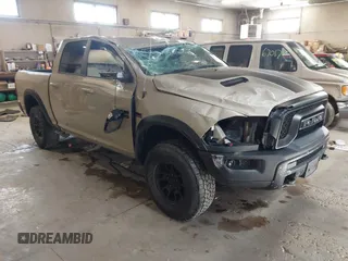 2017 Ram 1500 Rebel z VIN 1C6RR7YT4HS612150, wystawiony jako IAAI lot #41966115 z przebiegiem 146 135 mil mil oraz . Historia ofert i sprzedaży dostępna na DreamBid. Obrazek 1.