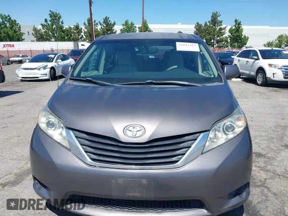 2011 Toyota Sienna LE AAS with VIN 5TDKK3DC4BS056872, listed as a IAAI auction lot 42643417 with 170,266 mi miles and . Bid and sale history available at DreamBid. Image 12.