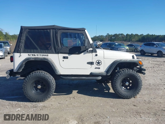 1997 Jeep Wrangler Sport with VIN 1J4FY19S7VP483735, listed as a IAAI auction lot 41469983 with 150,542 mi miles. Bid and sale history available at carsss.com. Image 13.