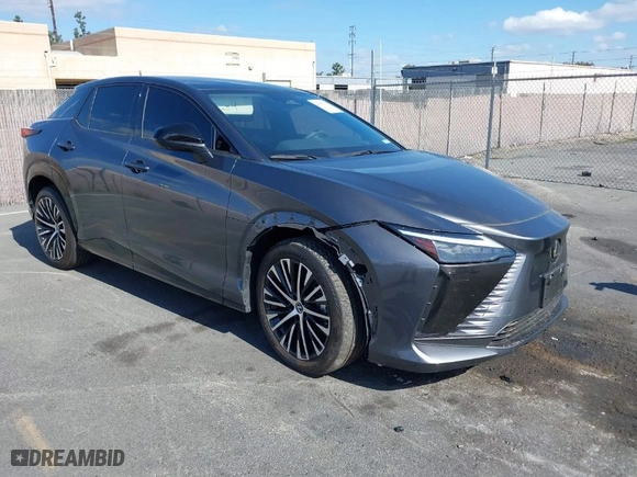 2023 Lexus RZ with VIN JTJAAAAB5PA011228, listed as a IAAI auction lot 41550311 with 6984 miles. Bid and sale history available at carsss.com. Image 1.