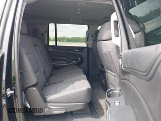 2019 Chevrolet Suburban LS with VIN 1GNSKGKC4KR128685, listed as a IAAI auction lot 42148721 with 92,346 mi miles and . Bid and sale history available at DreamBid. Image 8.