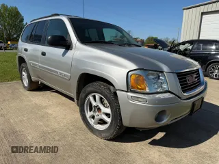 2004 GMC Envoy SLT with VIN 1GKDS13S742190702, listed as a Copart auction lot 52557035 with 202,843 mi miles and Clean Title. Bid and sale history available at carsss.com. Image 1.