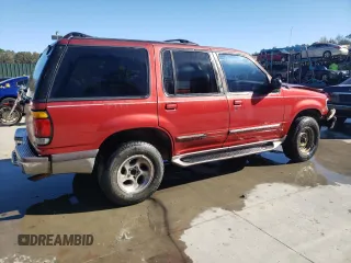 1997 Ford Explorer XL with VIN 1FMDU32E8VZC21604, listed as a Copart auction lot 81987654 with 156,141 mi miles and Salvage title. Bid and sale history available at DreamBid. Image 3.