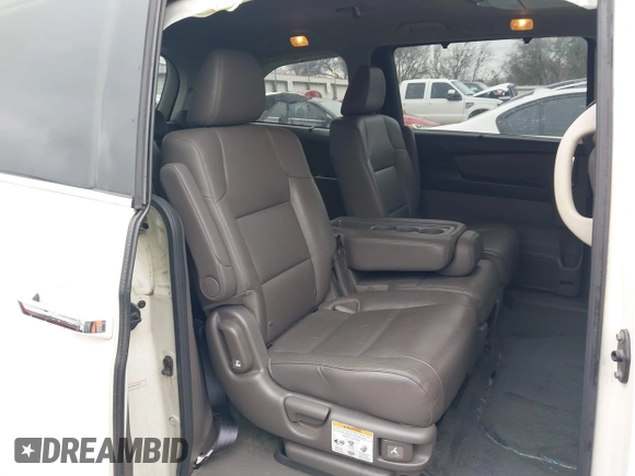2016 Honda Odyssey Touring Elite with VIN 5FNRL5H9XGB100116, listed as a IAAI auction lot 41543464 with 160,763 mi miles and . Bid and sale history available at DreamBid. Image 8.