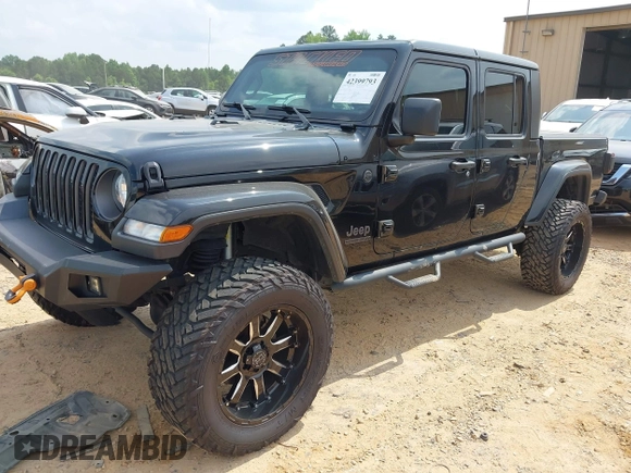 2021 Jeep Gladiator Willys with VIN 1C6HJTAG7ML514114, listed as a IAAI auction lot 42399793 with 78,829 mi miles and . Bid and sale history available at DreamBid. Image 2.
