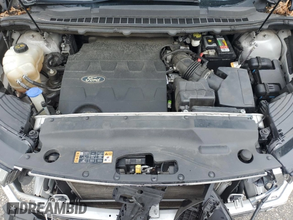 2015 Ford Edge SE z VIN 2FMTK3G85FBB58499, wystawiony jako Copart lot #56654025 z przebiegiem 93 626 mil mil oraz Szkoda całkowita • Salvage title. Historia ofert i sprzedaży dostępna na DreamBid. Obrazek 11.