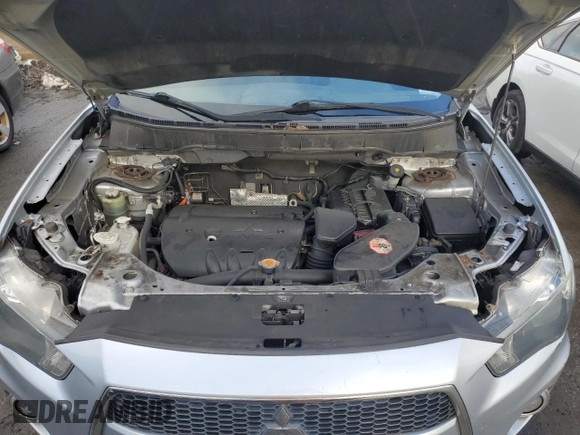 2013 Mitsubishi Outlander SE z VIN JA4JT3AW8DU014284, wystawiony jako Copart lot #85062254 z przebiegiem 167 630 mil mil oraz Czysty tytuł • Clean title. Historia ofert i sprzedaży dostępna na DreamBid. Obrazek 12.