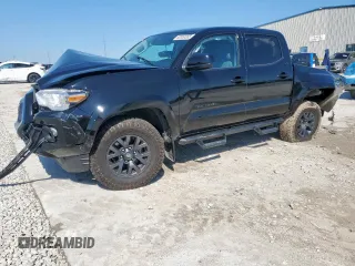 2023 Toyota Tacoma SR5 z VIN 3TMAZ5CN0PM219028, wystawiony jako Copart lot #52050355 z przebiegiem 31 371 mil mil oraz Szkody całkowita. Historia ofert i sprzedaży dostępna na DreamBid. Obrazek 1.