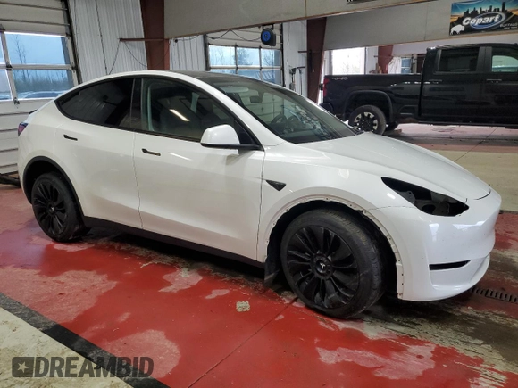 2023 Tesla Model Y Long Range with VIN 7SAYGDEE8PF758841, listed as a Copart auction lot 62851164 with 16,811 mi miles and Non Repairable. Bid and sale history available at DreamBid. Image 4.