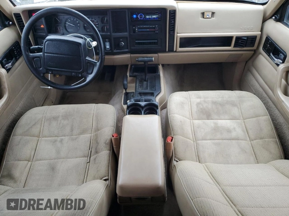 1996 Jeep Cherokee Sport with VIN 1J4FJ68S6TL112962, listed as a Copart auction lot 41540935 with 234,458 mi miles and Salvage Title. Bid and sale history available at carsss.com. Image 8.