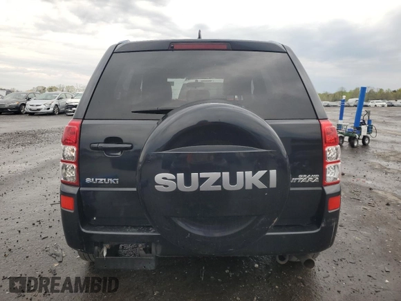 2009 Suzuki Grand Vitara z VIN JS3TE149794100133, wystawiony jako Copart lot #52919795 z przebiegiem 207 928 mil mil oraz Szkoda całkowita • Salvage title. Historia ofert i sprzedaży dostępna na DreamBid. Obrazek 6.