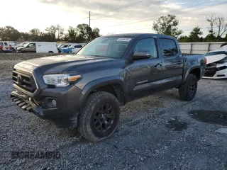 2020 Toyota Tacoma SR with VIN 5TFAX5GN7LX167742, listed as a Copart auction lot 60836235 with 78,095 mi miles and Salvage title. Bid and sale history available at DreamBid. Image 1.