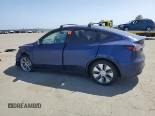 2023 Tesla Model Y Long Range with VIN 7SAYGAEE8PF927092, listed as a Copart auction lot 53917185 with 17,639 mi miles and Salvage Title. Bid and sale history available at DreamBid. Image 2.