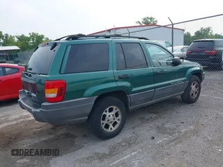 1999 Jeep Grand Cherokee Laredo с VIN 1J4G258S5XC543617, выставлен на аукционе IAAI как лот 39937200 с пробегом 133 461 миль миль и . История ставок и продаж доступна на DreamBid. Изображение 4.