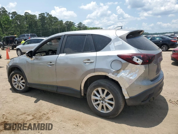 2014 Mazda CX-5 Sport with VIN JM3KE2BE2E0349755, listed as a Copart auction lot 58212375 with Not provided miles and Clean title. Bid and sale history available at DreamBid. Image 2.