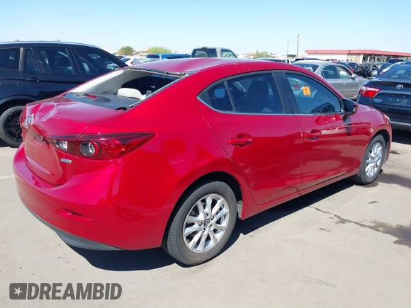 2016 Mazda Mazda3 i Sport with VIN JM1BM1U71G1345696, listed as a IAAI auction lot 41845701 with 141,646 mi miles. Bid and sale history available at carsss.com. Image 4.