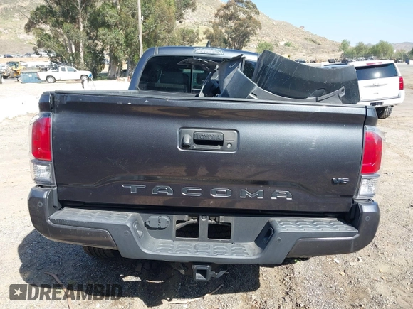 2021 Toyota Tacoma SR5 z VIN 3TMDZ5BN8MM117163, wystawiony jako IAAI lot #42070540 z przebiegiem 12 790 mil mil oraz . Historia ofert i sprzedaży dostępna na DreamBid. Obrazek 15.