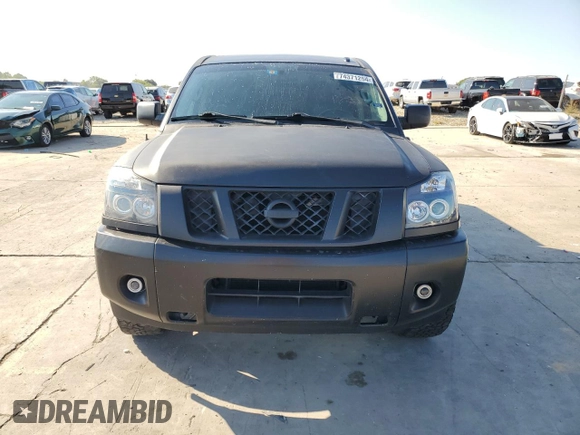 2015 Nissan Titan SL with VIN 1N6AA0ED7FN510609, listed as a Copart auction lot 74371254 with 115,916 mi miles and Salvage Title. Bid and sale history available at carsss.com. Image 5.