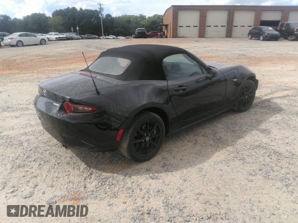 2021 Mazda MX-5 Miata Sport with VIN JM1NDAB73M0454064, listed as a IAAI auction lot 42613537 with 24,630 mi miles and . Bid and sale history available at DreamBid. Image 4.