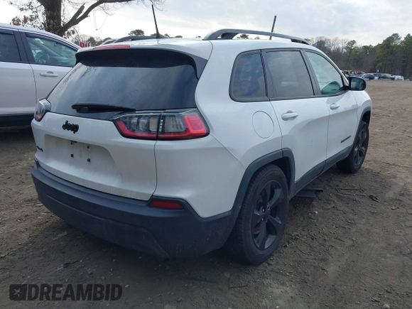 2021 Jeep Cherokee Latitude Plus with VIN 1C4PJMLBXMD185415, listed as a IAAI auction lot 41773843 with 62,770 mi miles and . Bid and sale history available at DreamBid. Image 4.