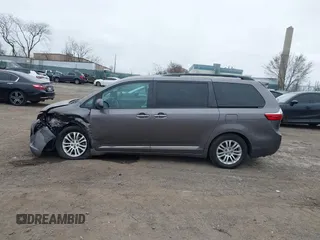 2016 Toyota Sienna XLE with VIN 5TDYK3DCXGS737846, listed as a IAAI auction lot 41782055 with 126,846 mi miles. Bid and sale history available at carsss.com. Image 14.