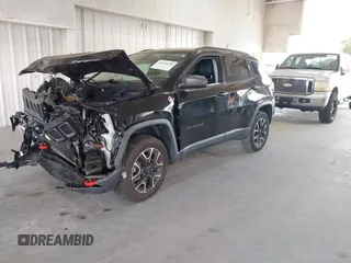 2020 Jeep Compass Trailhawk with VIN 3C4NJDDB3LT170463, listed as a IAAI auction lot 42446080 with 83,336 mi miles and . Bid and sale history available at DreamBid. Image 18.